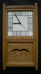 This pendulum wall clock is based on the Rennie Mackintosh style Argyle chair back with a face based on the Hill House clock.