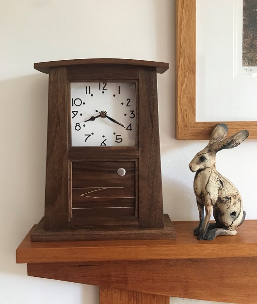 This shows the "Moonlight Bay" Arts and Crafts inspired mantle clock in situ to give an idea of the size.
