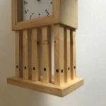 This is a close up view of the Mackintosh pillar clock showing the legs.