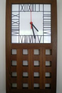 This large lattice wall clock was inspired by the Mackintosh designed wall clock in the hall of the Hill House.