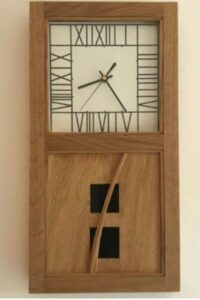 This is a large wall clock based on the Mackintosh reeds design in the Glasgow School of art library.